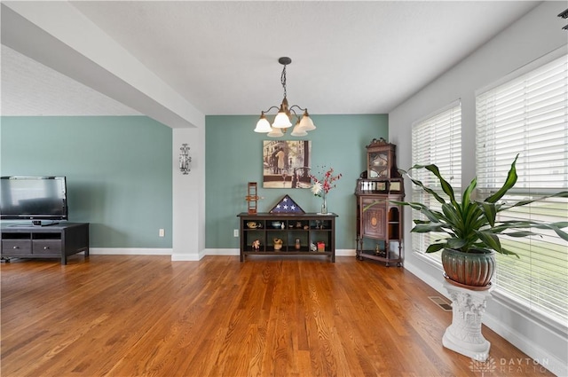 1750 Greentree Meadows Dr, Lebanon, OH 45036 - dining room featuring a chandelier, wood finished floors, and baseboards