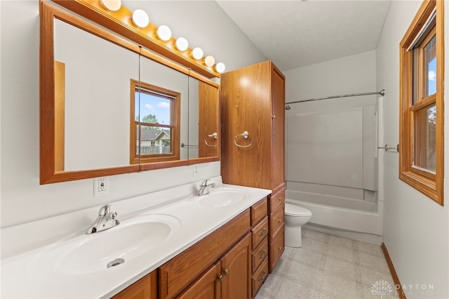 1410 Hunter Ct, Troy, OH 45373 - full bath featuring double vanity, shower / tub combination, and tile patterned floors