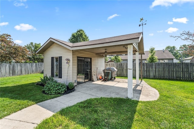 1410 Hunter Ct, Troy, OH 45373 - fenced backyard with a patio and grilling area