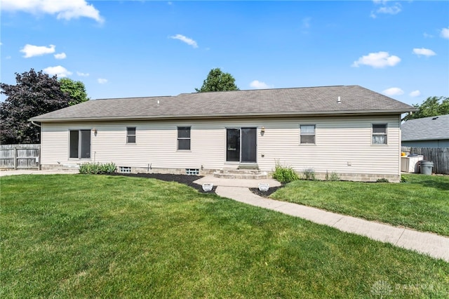 1410 Hunter Ct, Troy, OH 45373 - rear view of house featuring roof with shingles