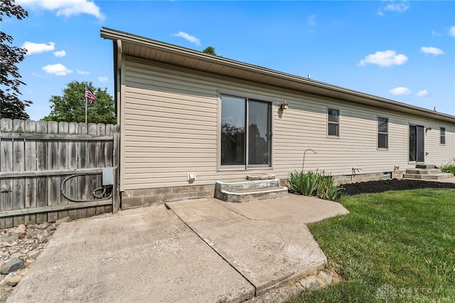 1410 Hunter Ct, Troy, OH 45373 - back of house featuring entry steps and a patio