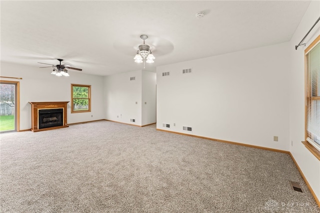 1410 Hunter Ct, Troy, OH 45373 - unfurnished living room featuring ceiling fan, carpet floors, and a fireplace