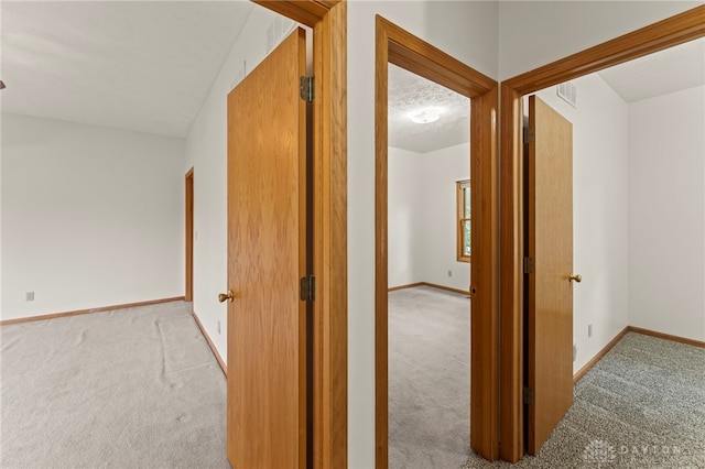 1410 Hunter Ct, Troy, OH 45373 - hallway featuring carpet and baseboards