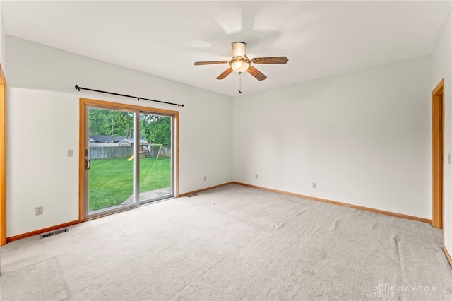 1410 Hunter Ct, Troy, OH 45373 - empty room with light colored carpet and a ceiling fan