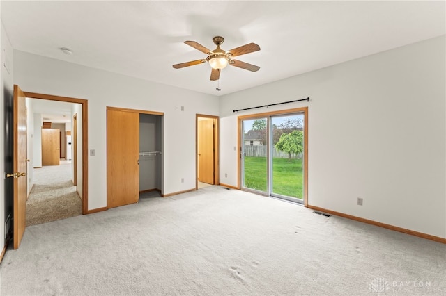 1410 Hunter Ct, Troy, OH 45373 - unfurnished bedroom featuring light carpet, access to outside, a closet, and a ceiling fan