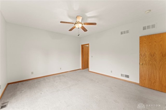 1410 Hunter Ct, Troy, OH 45373 - empty room with carpet floors and a ceiling fan