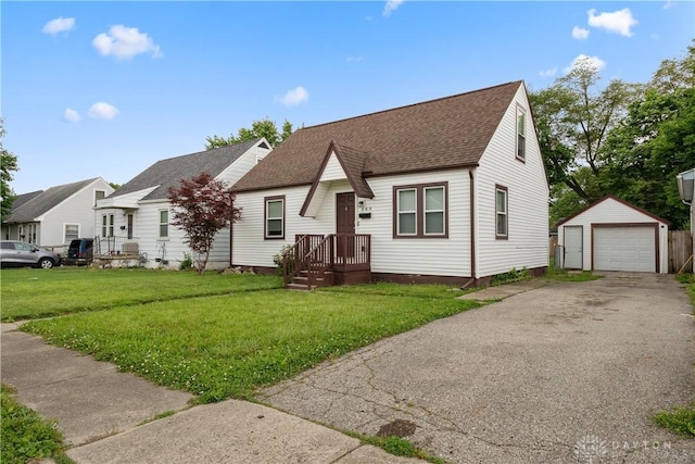 849 Princeton Ave, Fairborn, OH 45324 - view of front of house featuring an outdoor structure, a front yard, a garage, and a shingled roof
