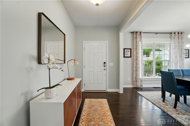 1596 Amberley Ct, Beavercreek Twp, OH 45385 - foyer featuring dark wood finished floors and baseboards