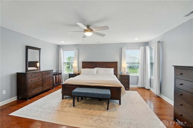 1596 Amberley Ct, Beavercreek Twp, OH 45385 - bedroom with baseboards, wood finished floors, a ceiling fan, and recessed lighting