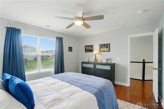 1596 Amberley Ct, Beavercreek Twp, OH 45385 - bedroom featuring wood finished floors, ceiling fan, and baseboards