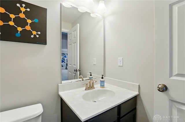 1596 Amberley Ct, Beavercreek Twp, OH 45385 - half bathroom featuring vanity and toilet