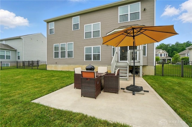 1596 Amberley Ct, Beavercreek Twp, OH 45385 - back of house with a patio and outdoor dining area