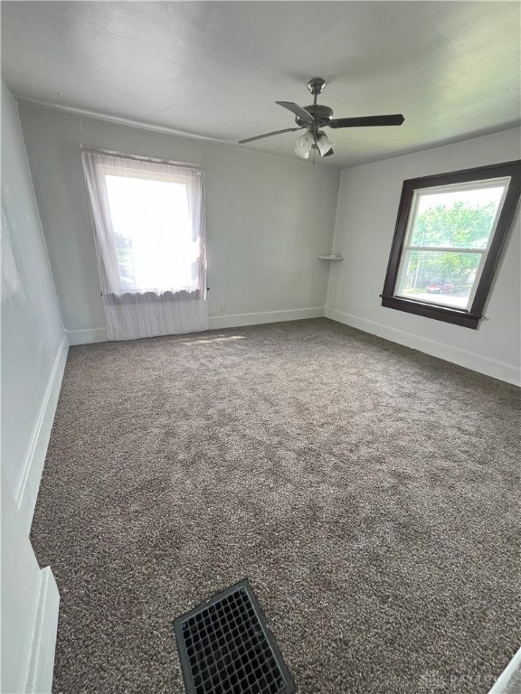 2821 E 5th St Unit 2819, Dayton, OH 45403 - carpeted empty room with a ceiling fan and baseboards