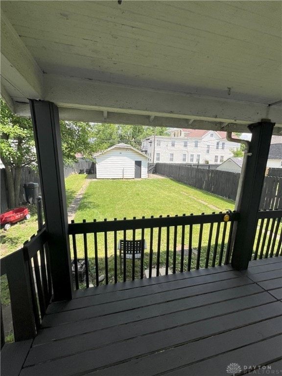 2821 E 5th St Unit 2819, Dayton, OH 45403 - wooden deck featuring a fenced backyard and a storage unit