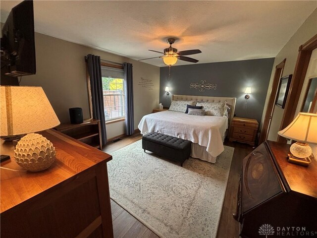 95 Fox Harbor Dr, Troy, OH 45373 - bedroom with wood finished floors and a ceiling fan