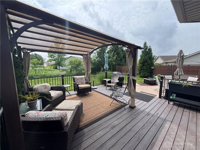 95 Fox Harbor Dr, Troy, OH 45373 - wooden deck with a pergola and an outdoor living space with a fire pit