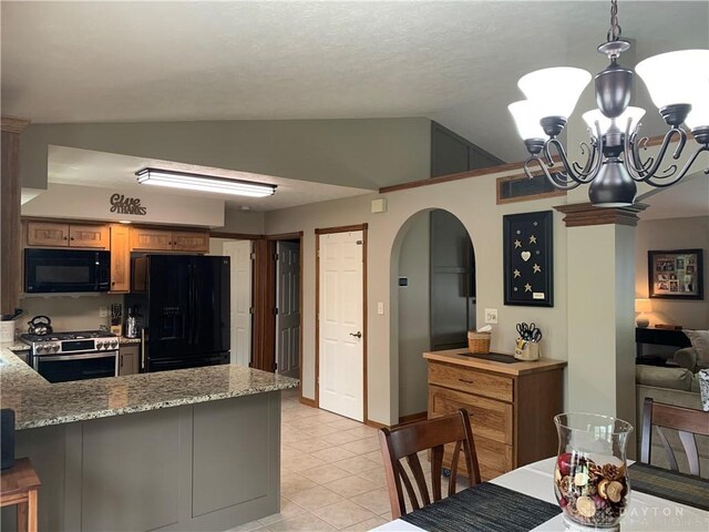 95 Fox Harbor Dr, Troy, OH 45373 - kitchen with black appliances, lofted ceiling, arched walkways, a peninsula, and a chandelier