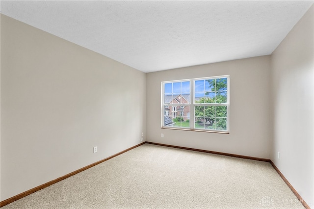 2159 Bassett Ct, Beavercreek, OH 45434 - spare room with light carpet and baseboards