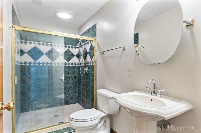 2159 Bassett Ct, Beavercreek, OH 45434 - bathroom with toilet, a stall shower, and a sink