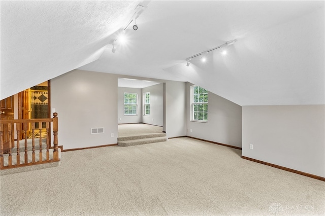 2159 Bassett Ct, Beavercreek, OH 45434 - bonus room with carpet floors, baseboards, and vaulted ceiling