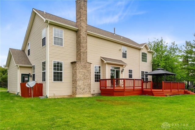 2159 Bassett Ct, Beavercreek, OH 45434 - back of property with a gazebo, a chimney, a wooden deck, and a yard