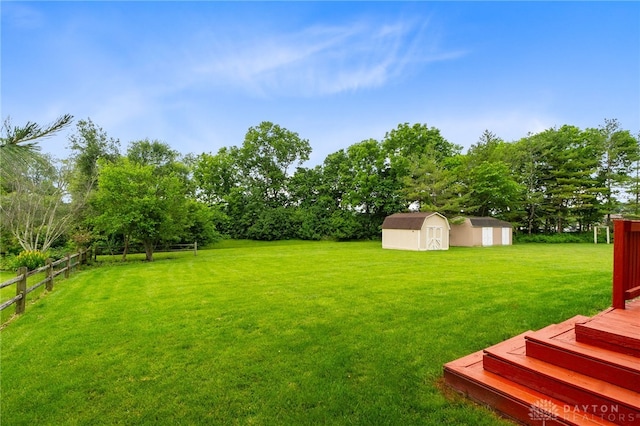 2159 Bassett Ct, Beavercreek, OH 45434 - view of yard featuring a deck and view of scattered trees