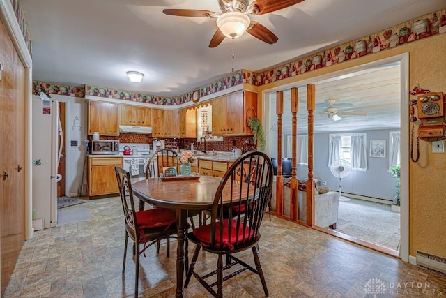 4292 Terrace Rd, College Corner, OH 45003 - dining room with a ceiling fan and baseboard heating