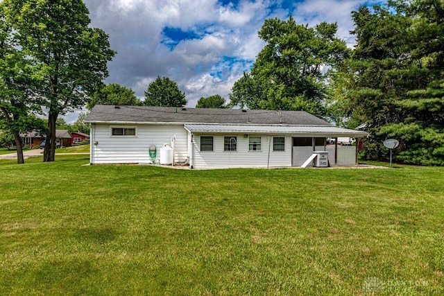 4292 Terrace Rd, College Corner, OH 45003 - rear view of house featuring a yard and central AC