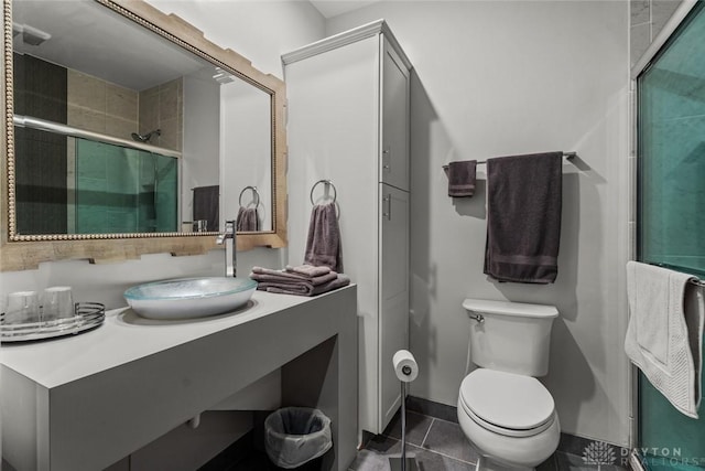 2230 S Patterson Blvd Unit 21, Dayton, OH 45409 - bathroom with tile patterned flooring, toilet, a stall shower, and vanity