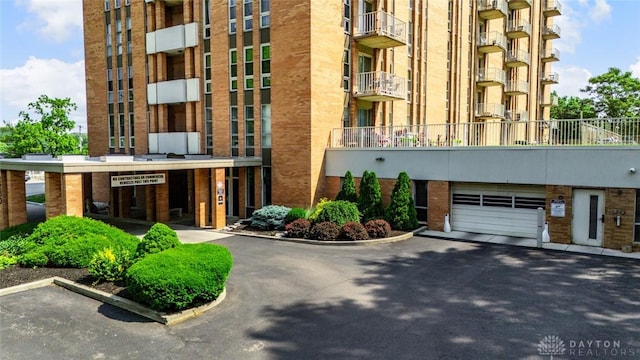 2230 S Patterson Blvd Unit 21, Dayton, OH 45409 - view of apartment building / complex with an attached garage