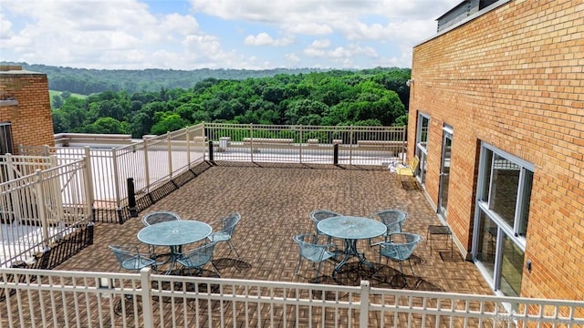 2230 S Patterson Blvd Unit 21, Dayton, OH 45409 - view of yard with a wooded view and a patio