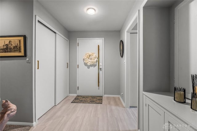 2230 S Patterson Blvd Unit 21, Dayton, OH 45409 - entrance foyer with light wood-style floors and baseboards
