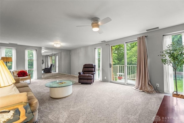2230 S Patterson Blvd Unit 21, Dayton, OH 45409 - living room with ceiling fan and carpet