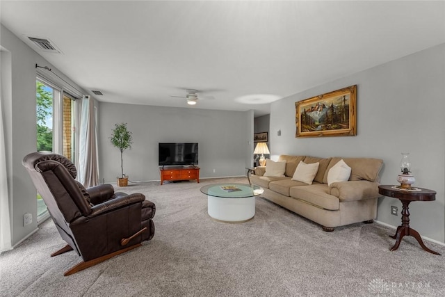 2230 S Patterson Blvd Unit 21, Dayton, OH 45409 - living room with carpet, a ceiling fan, and baseboards