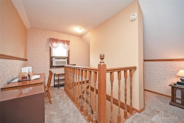 1064 Wilmington Ave, Dayton, OH 45420 - corridor with wallpapered walls, carpet flooring, vaulted ceiling, cooling unit, and an upstairs landing