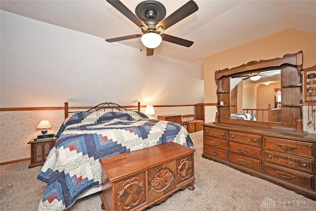 1064 Wilmington Ave, Dayton, OH 45420 - carpeted bedroom featuring wallpapered walls, ceiling fan, and vaulted ceiling