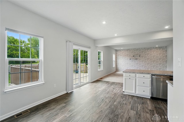 344 Warm Springs Dr, Fairborn, OH 45324 - kitchen featuring white cabinetry, dark wood-style flooring, dishwasher, baseboards, and recessed lighting