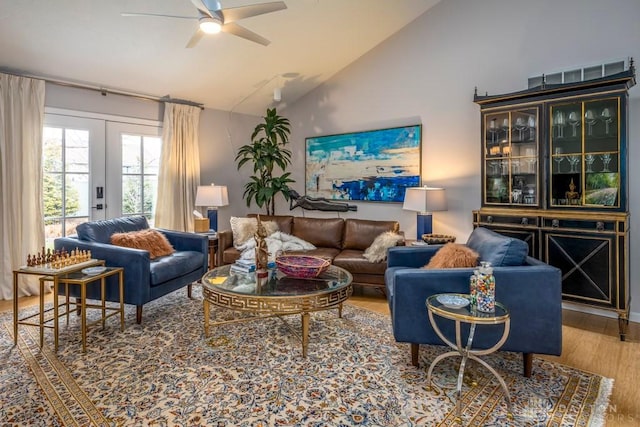 1126 Justin Ridge Way, Waynesville, OH 45068 - living area with wood finished floors, a ceiling fan, and high vaulted ceiling