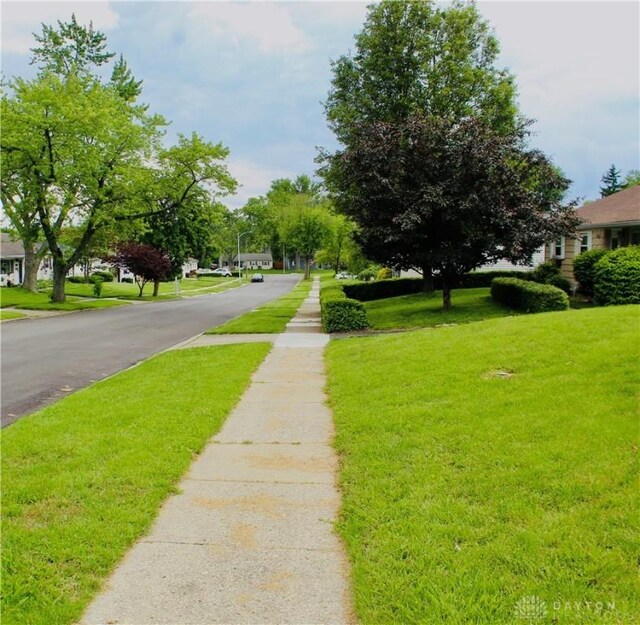 2589 Midvale St, Dayton, OH 45420 - view of asphalt road featuring sidewalks