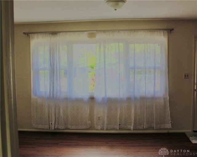 2589 Midvale St, Dayton, OH 45420 - empty room with dark wood-type flooring