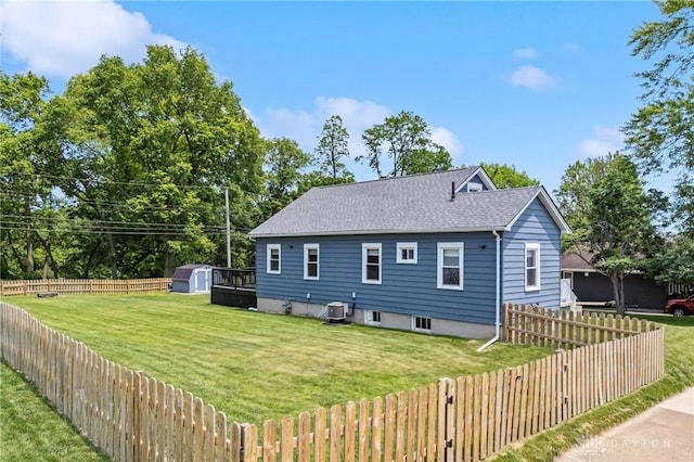 1153 Highridge Ave, Dayton, OH 45420 - rear view of house with a shed, a fenced backyard, and roof with shingles