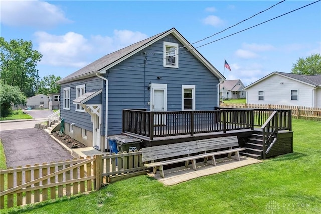 1153 Highridge Ave, Dayton, OH 45420 - rear view of property with a wooden deck
