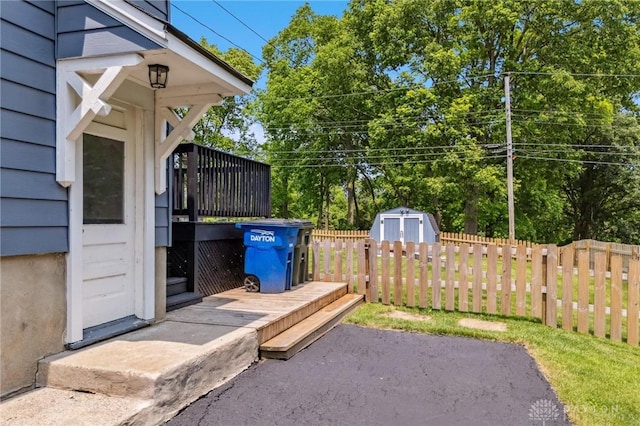 1153 Highridge Ave, Dayton, OH 45420 - view of patio featuring a storage unit