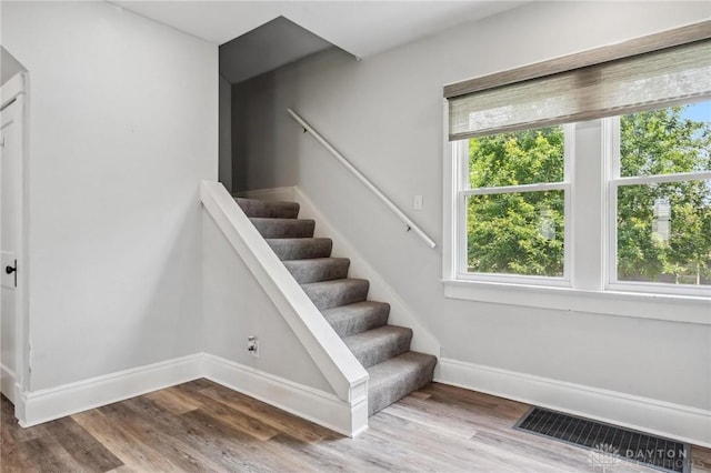 1153 Highridge Ave, Dayton, OH 45420 - stairs featuring healthy amount of natural light and wood finished floors