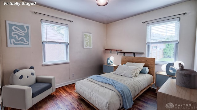 344 Triangle Ave, Oakwood, OH 45419 - bedroom with wood finished floors and baseboards