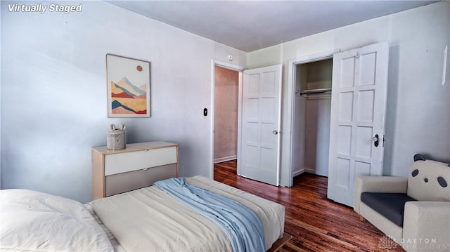 344 Triangle Ave, Oakwood, OH 45419 - bedroom featuring dark wood-type flooring and a closet