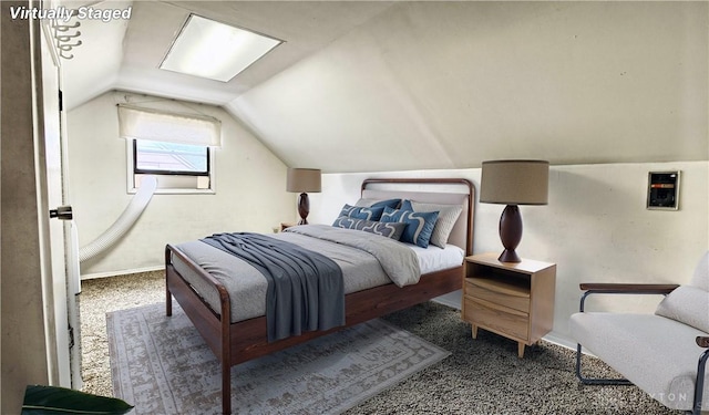 344 Triangle Ave, Oakwood, OH 45419 - bedroom with carpet flooring, lofted ceiling, and baseboards