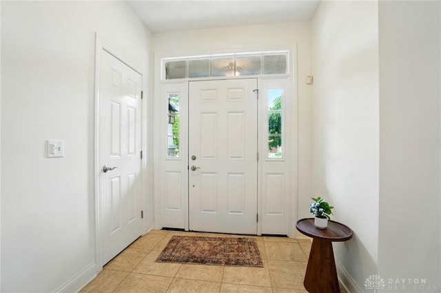 160 Harbour Dr, Springboro, OH 45066 - entryway featuring light tile patterned flooring and baseboards