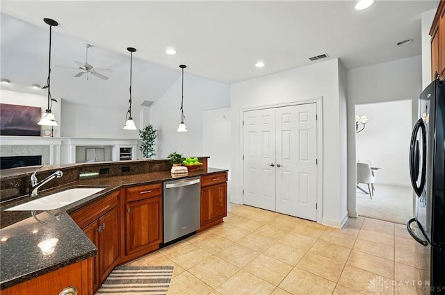 160 Harbour Dr, Springboro, OH 45066 - kitchen with dishwasher, a sink, freestanding refrigerator, a ceiling fan, and open floor plan