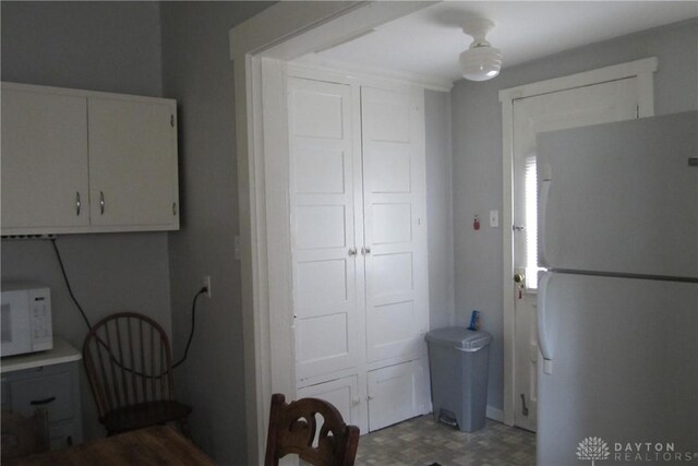 1600 Wayne Ave, Dayton, OH 45410 - kitchen with white appliances and white cabinetry